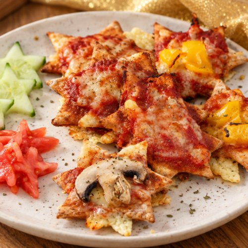 Festliche Mini Pizza Sterne auf Keramikteller